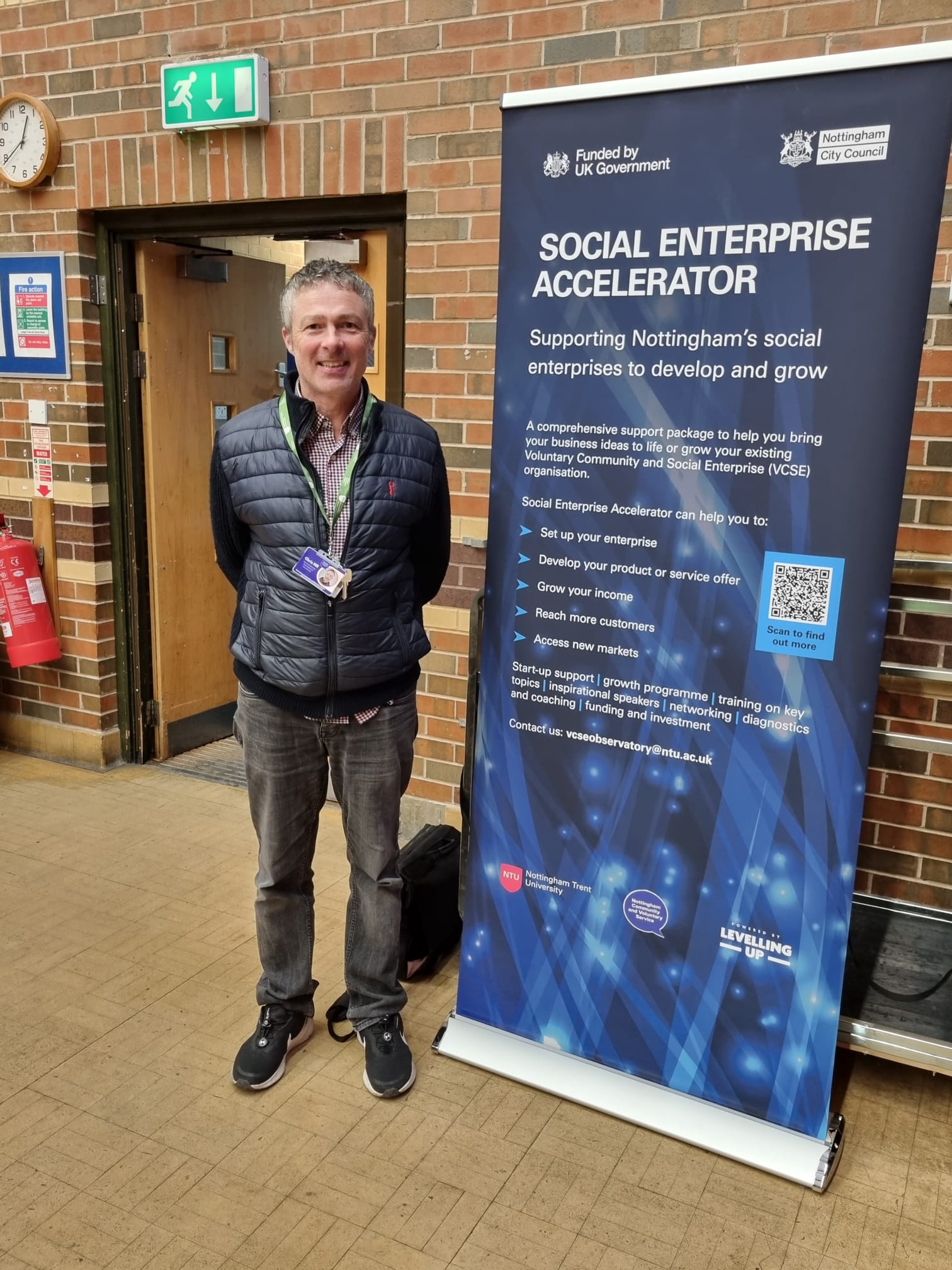 Chris Hill, NCVS Social Enterprise Development Coordinator, stood in front of the Social Enterprise Accelerator banner