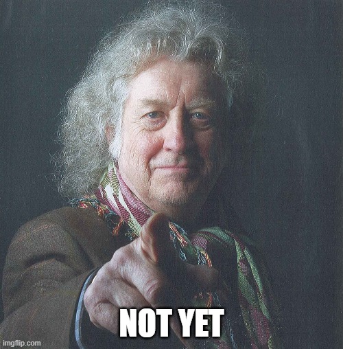 Noddy Holder pointing, with the words not yet